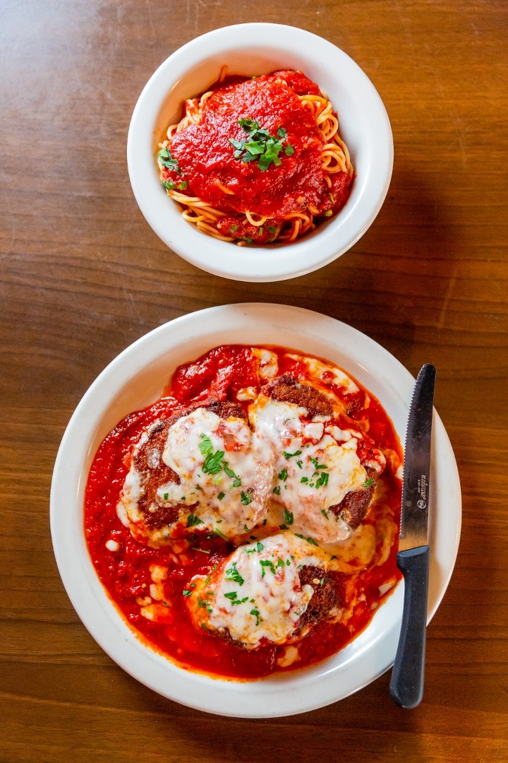 Chicken Parmigiana with a side of spaghetti