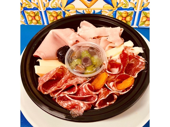 Plate of Charcuterie with Italian Cheeses and meat and Olives