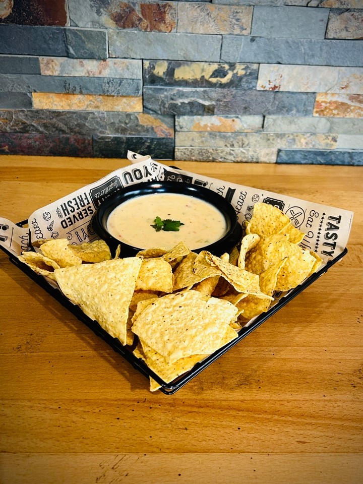 WHITE QUESO DIP WITH TORTILLA CHIPS