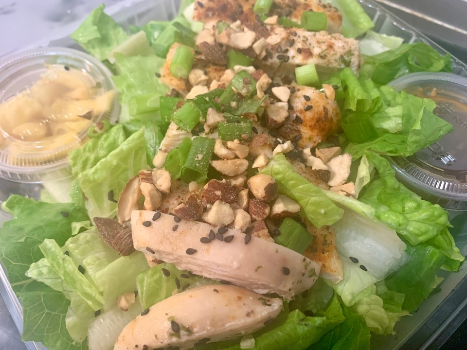 Asian Chicken Salad with Sesame seeds, almonds, & Soy ginger dressing