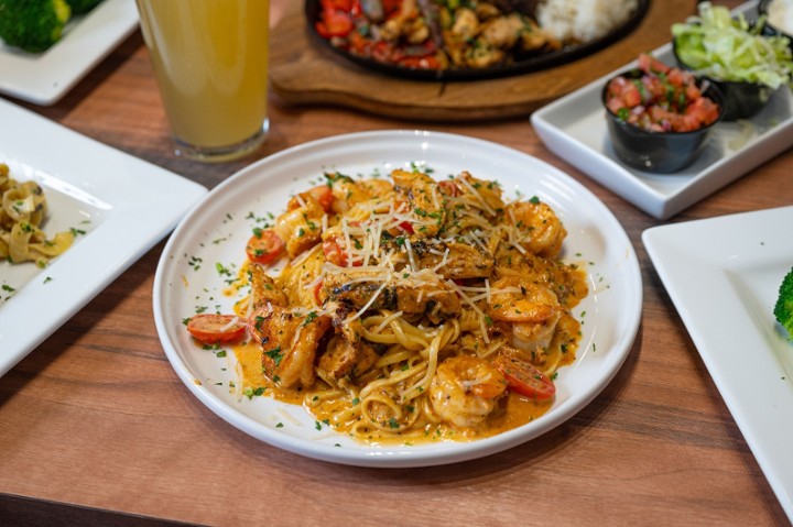 Cajun Chicken and Shrimp Alfredo with Garlic Bread