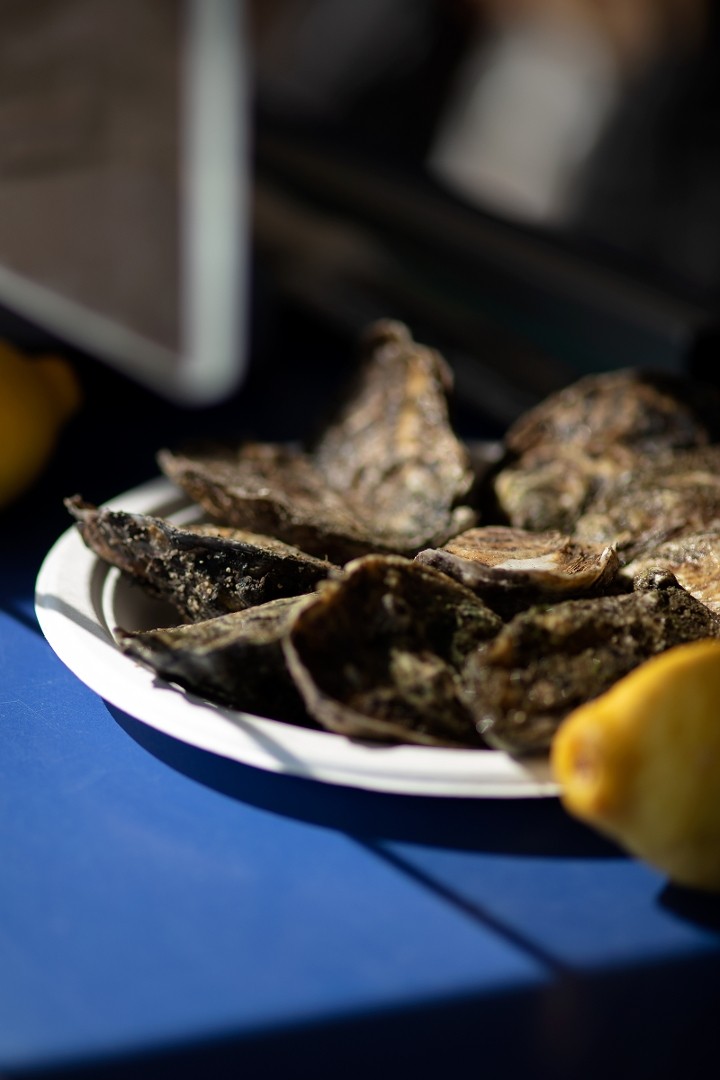 Un-Shucked Oysters By The Dozen