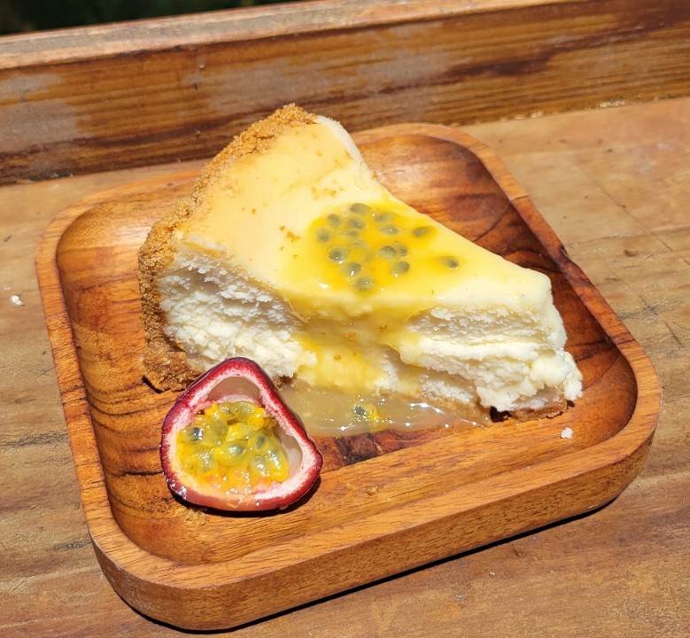 Vanilla Cheesecake with Passionfruit Coulis