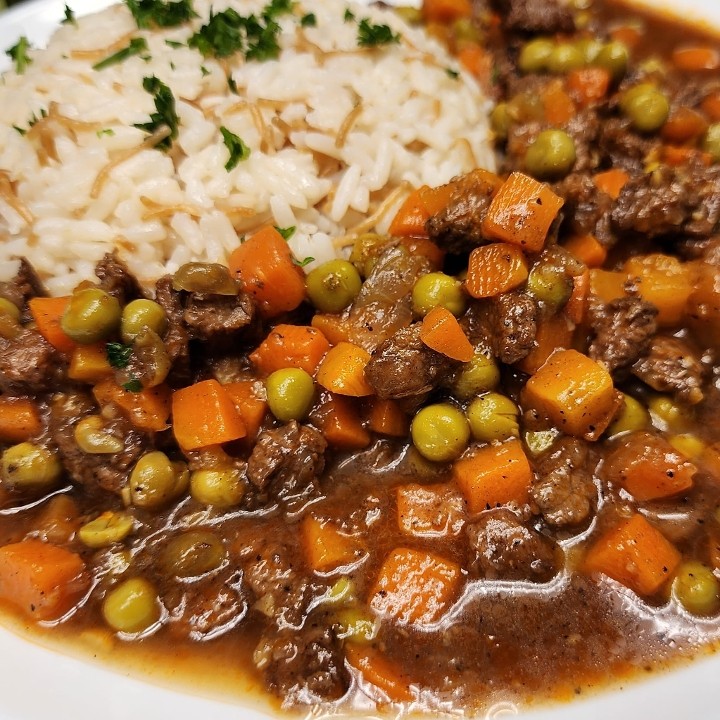 LEBANESE HOMESTYLE BEEF STEW WITH PEAS AND CARROTS.