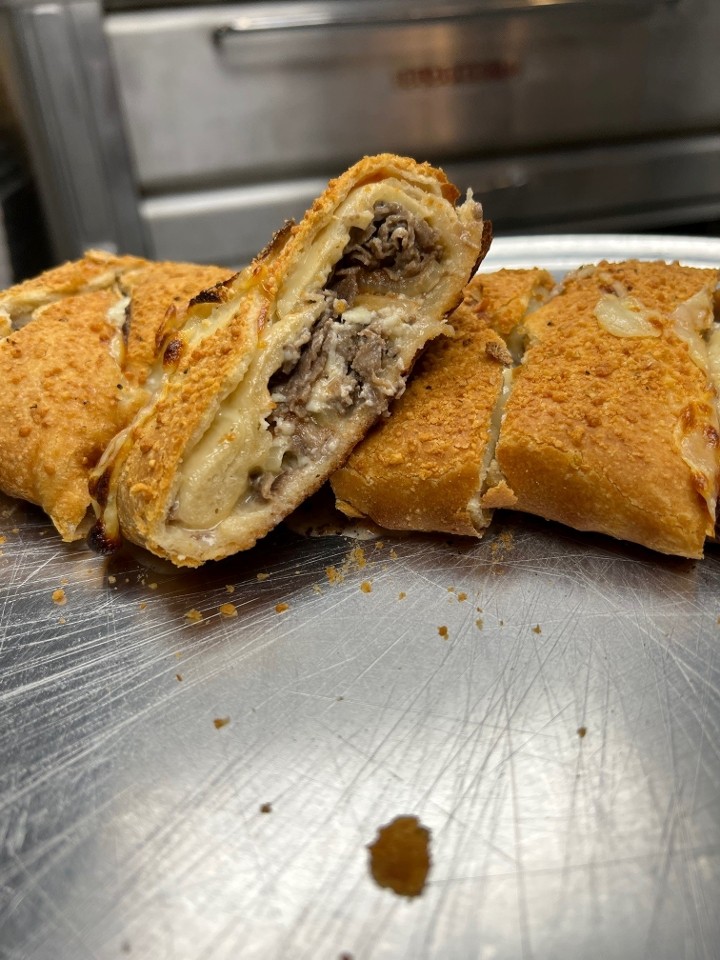 Cheesesteak Stromboli with Red Pepper Oil