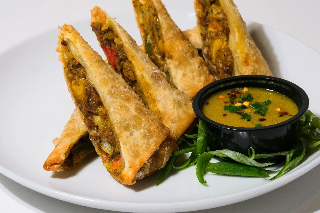 Curry Goat & Plantain Egg Roll