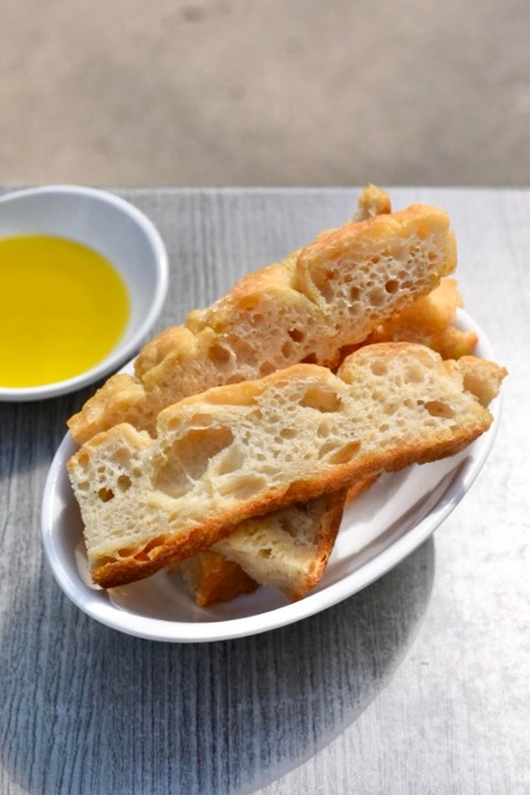 Side of focaccia with olive oil