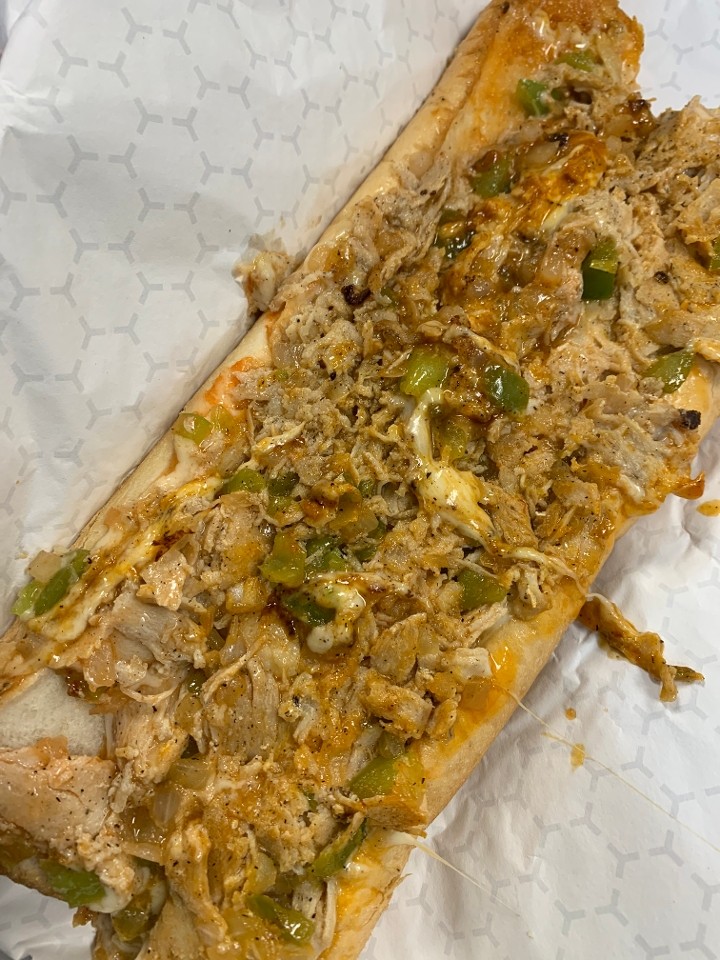 12 oz Buffalo Chicken Philly Cheesesteak with peppers onions and Buffalo sauce (12oz of meat on a Amoroso roll)