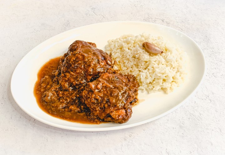 Pollo Guisado con Arroz