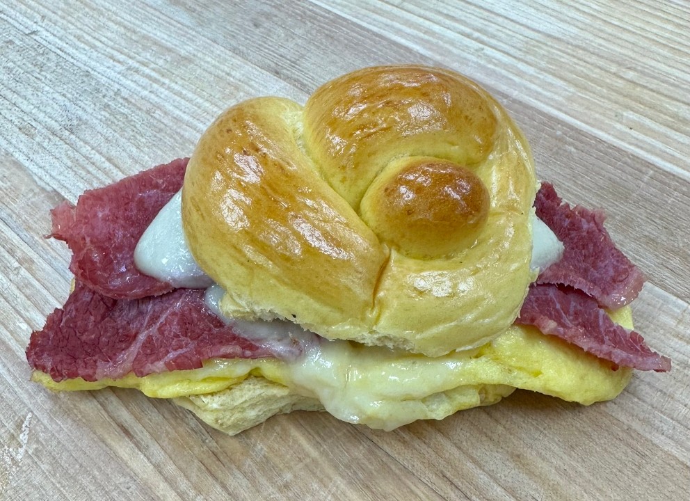 CORNED BEEF, EGGS, & SWISS ON A CHALLAH ROLL