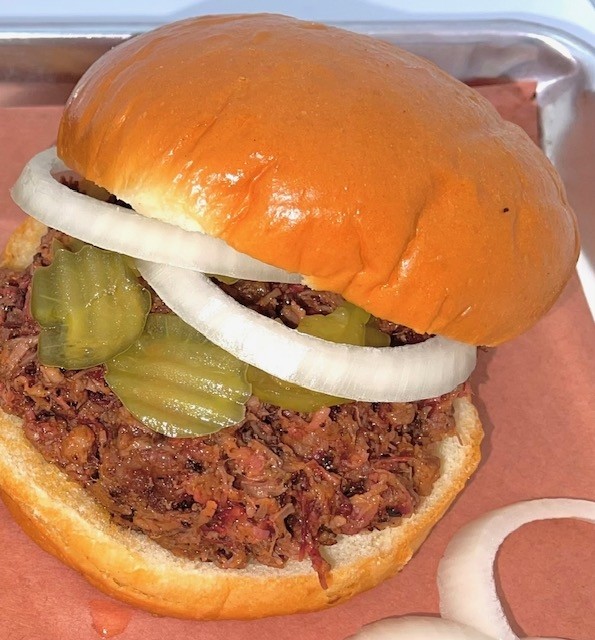 Chopped Brisket Sandwich with fries