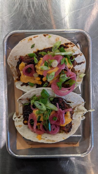 JERK BRISKET TACOS