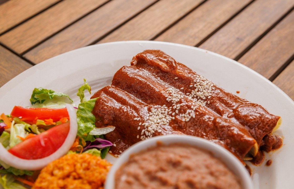 Holy Mole Enchiladas Plate. Vegan