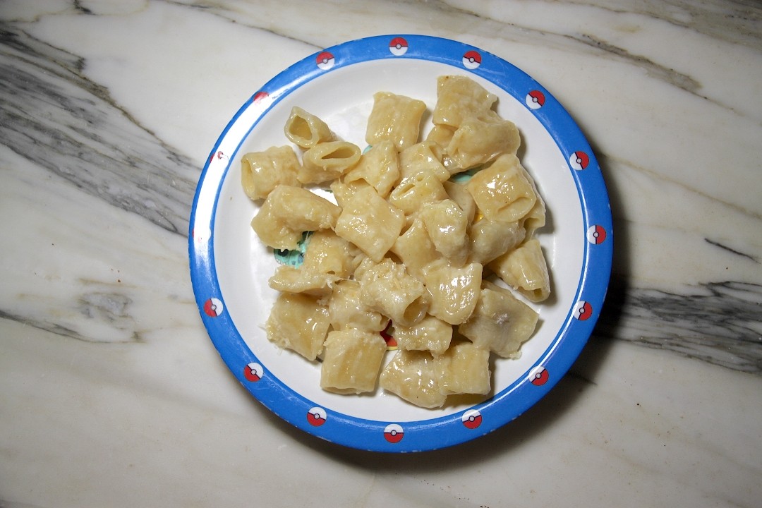 Kid pasta butter and cheese