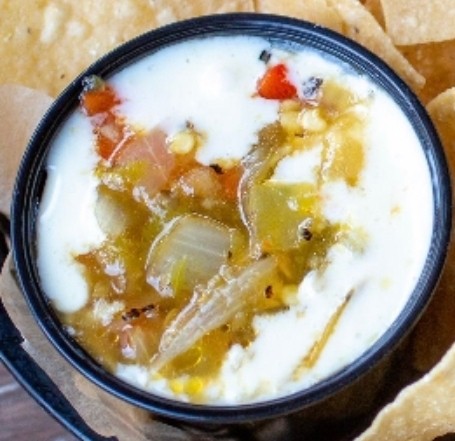 Green Chile Queso 5oz side (no chips).