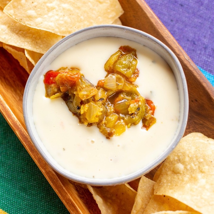 Green Chile Queso + Chips.