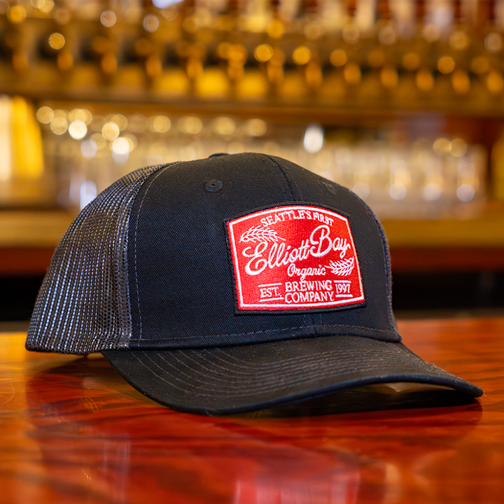 Red Patch Black Trucker Hat