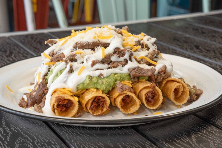 5 Beef Rolled Tacos w/ Carne On Top