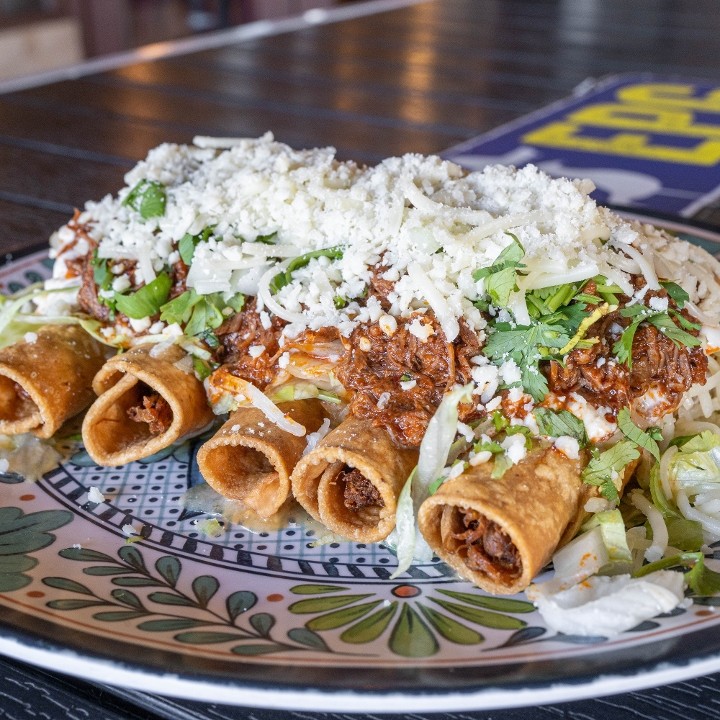 5 Rolled Tacos w/ Birria on Top