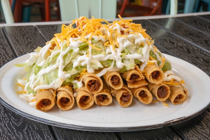 12 Chicken Rolled Tacos