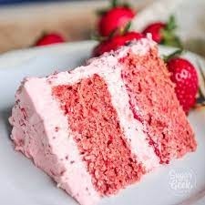 Slice of strawberry  cake w/ strawberry icing