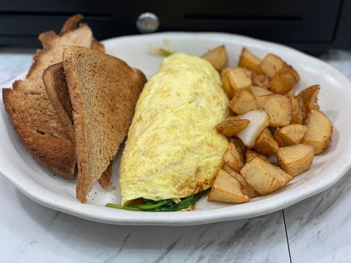 OMELETTE. SPINACH TOMATO ONION AND FETA