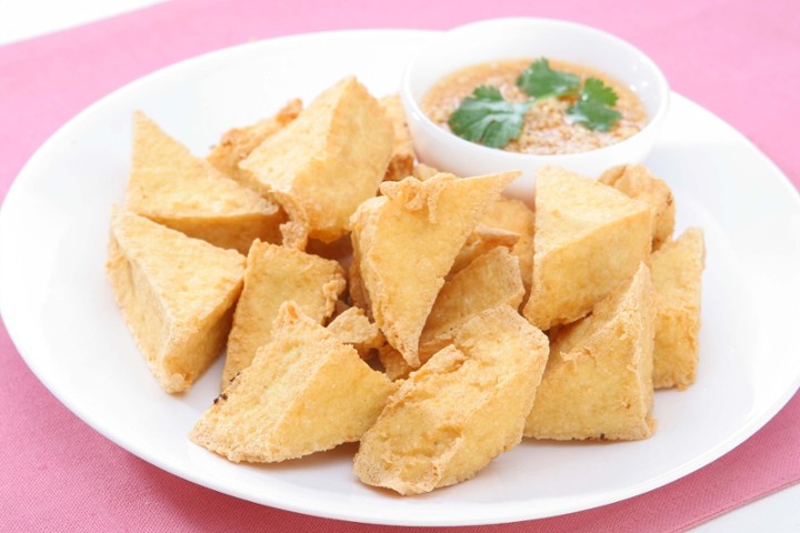 Thai Fried Tofu with peanut topped Thai honey sauce