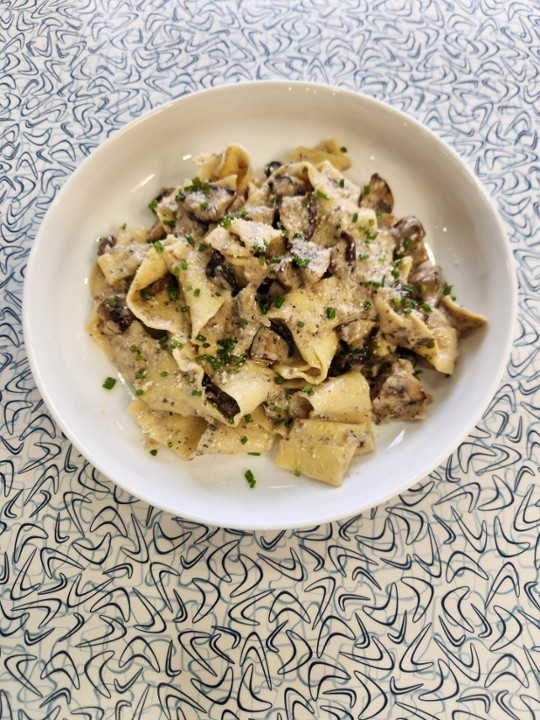 Homemade Tagliatelle With Mushrooms And Truffle Cream Sauce