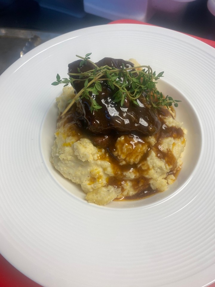 Braised Beef Short Rib & Grits with a Demi Glaze on top