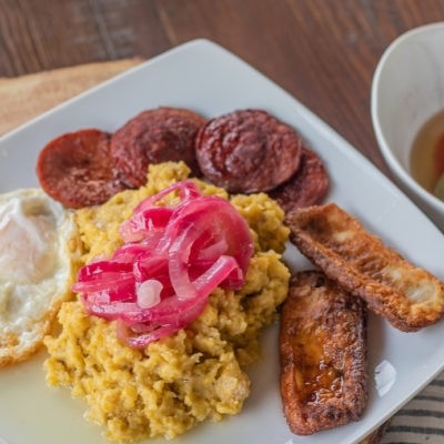 Mangú with fried Dominican cheese, salami & eggs any style breakfast