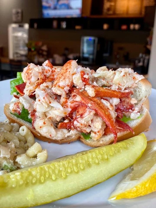 LOBSTER ROLL (hot butter lobster roll on a toasted bun with fries, pickle and mac salad!