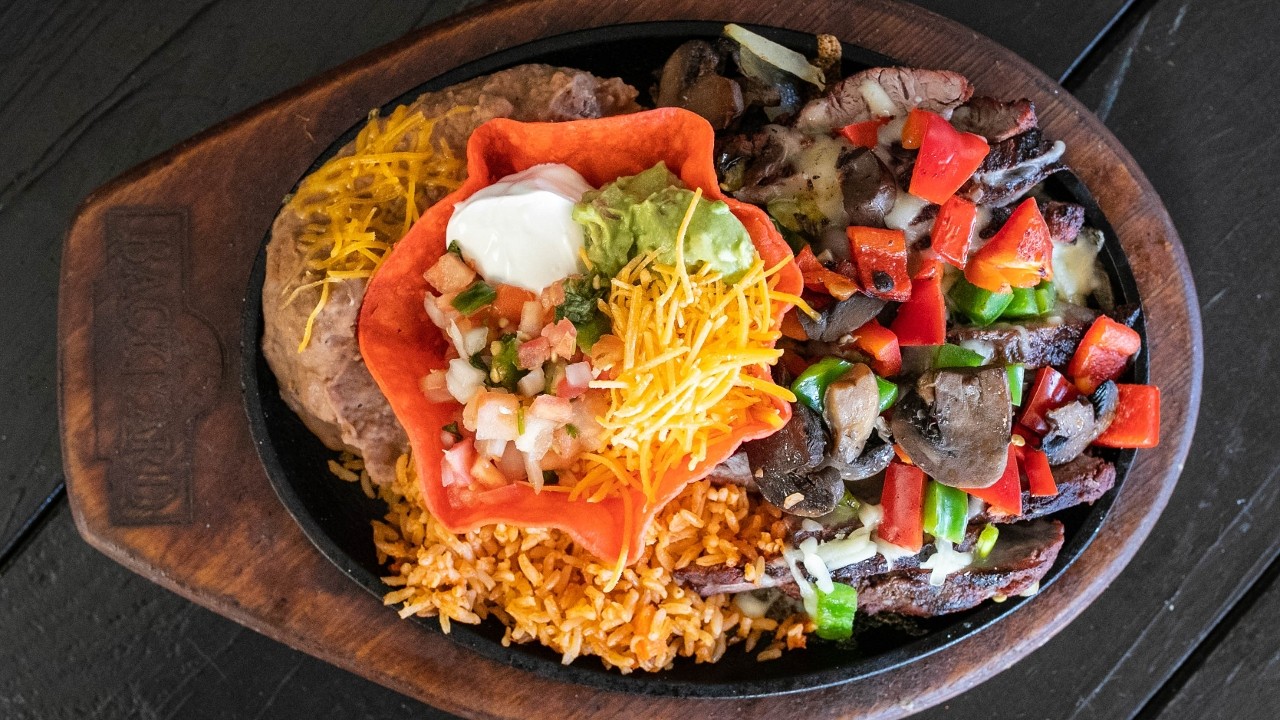 SMOTHERED BEEF FAJITAS